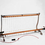 Apparecchio di Mach per generare moti ondulatori diversi